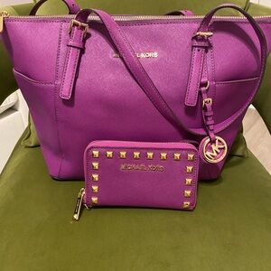 Michael Kors Purple Shoulder Bag and matching wristlet wallet. Like new